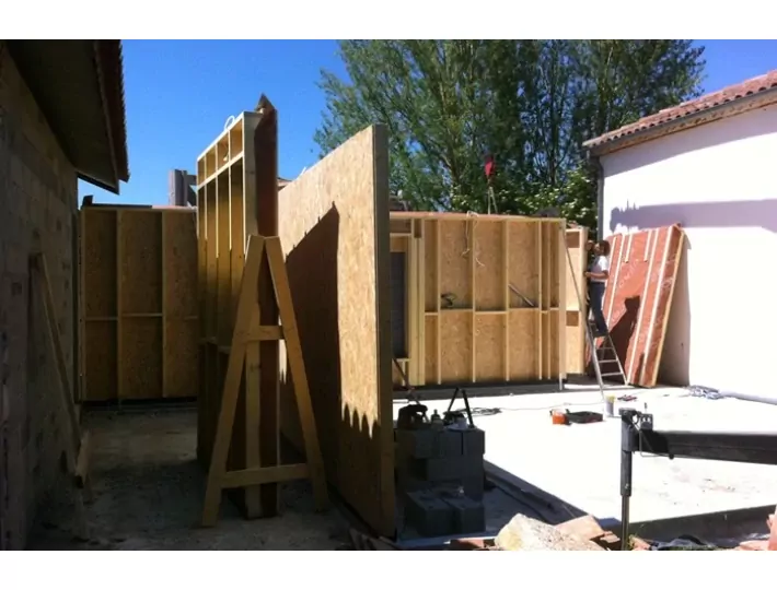 Photo: Agrandissement d'une maison en ossature bois - éco constructeur Comparin