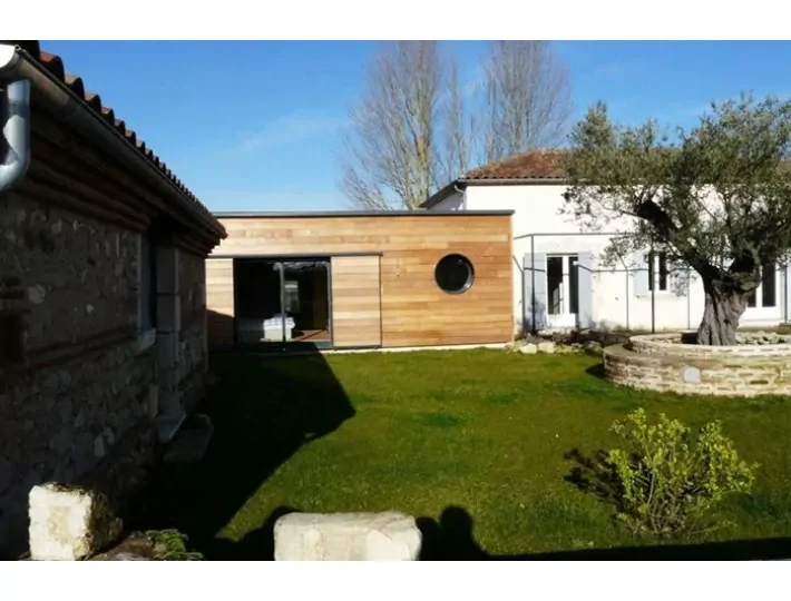 Photo: Agrandissement d'une maison en ossature bois - éco constructeur Comparin