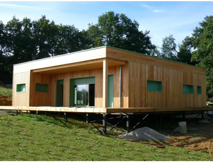 Photo: Comparin - Maison ossature bois bioclimatique