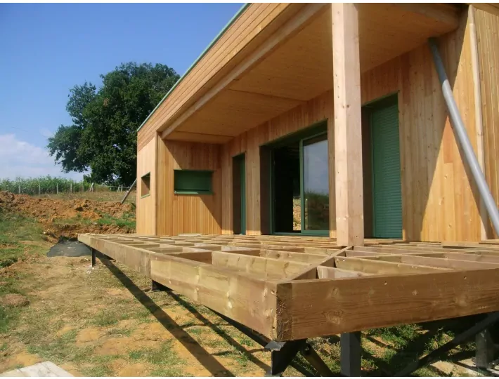 Photo: Comparin - Maison ossature bois bioclimatique