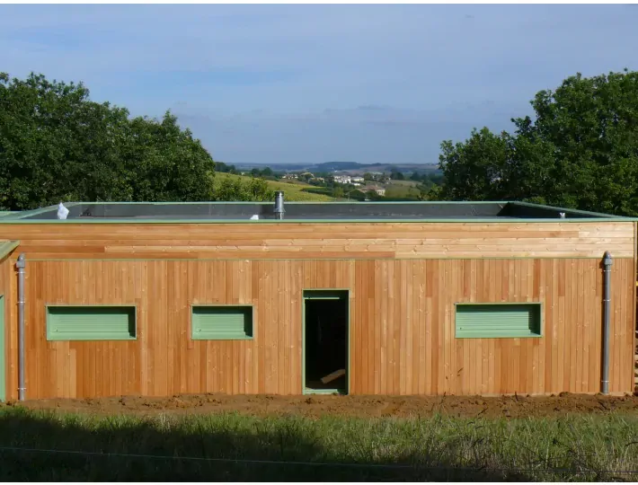 Photo: Comparin - Maison ossature bois bioclimatique