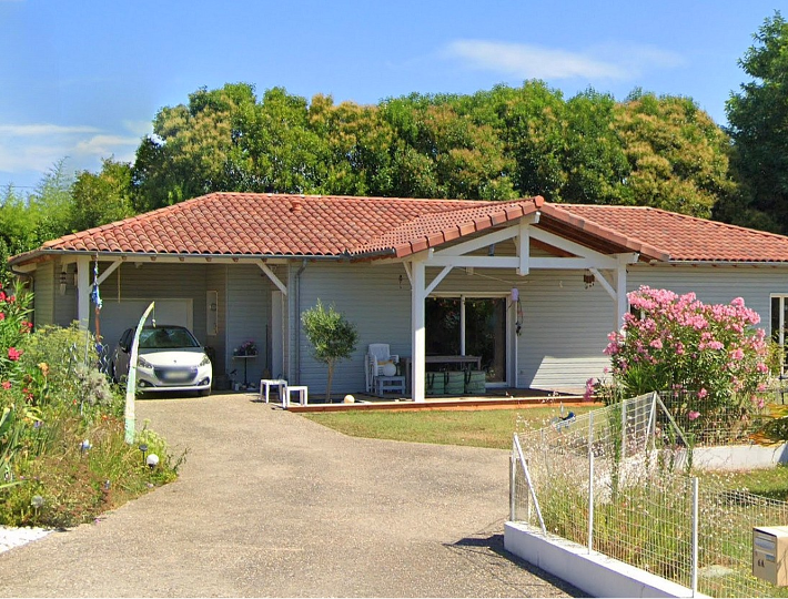 Photo: Maison en ossature bois, isolation laine de bois - Comparin